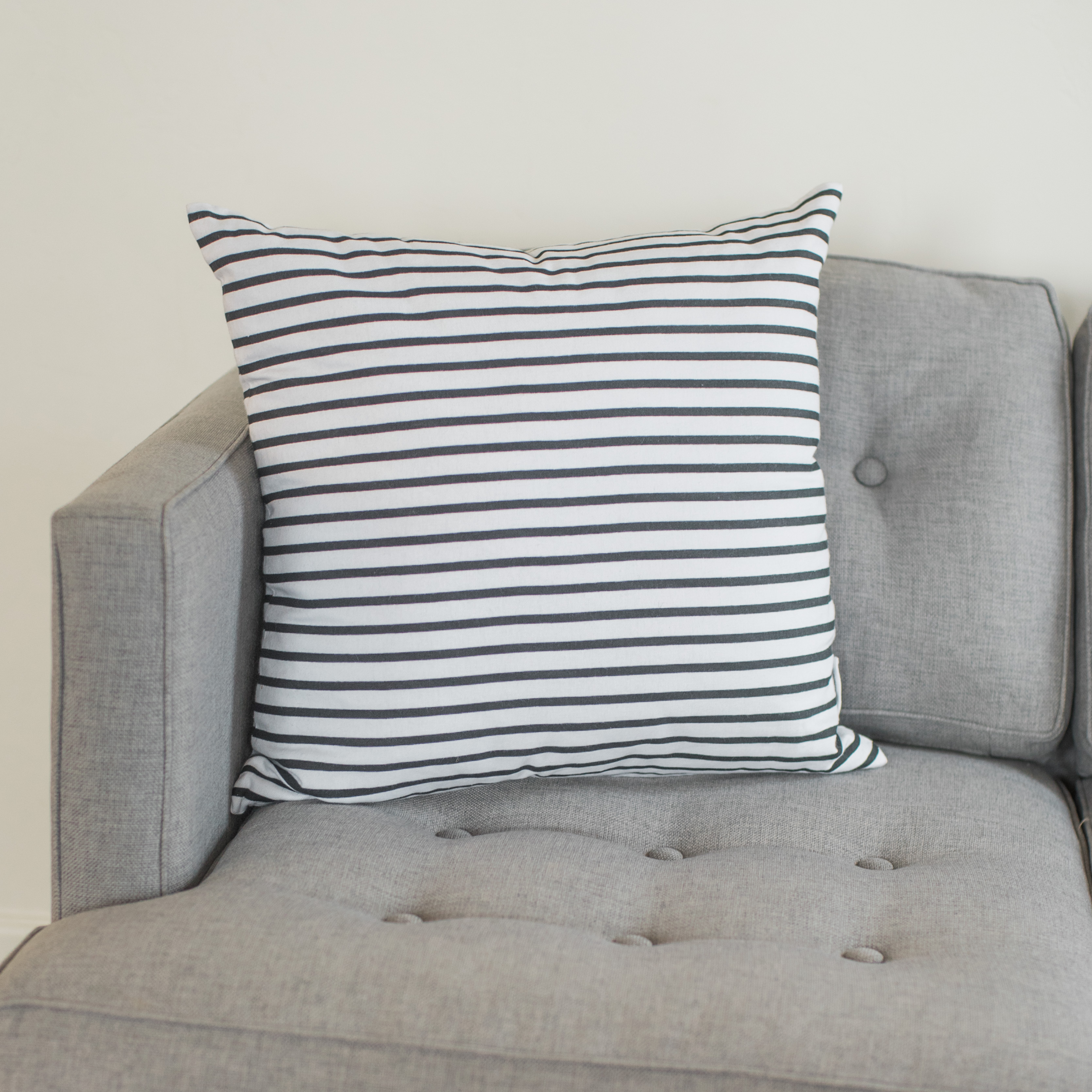 Gray and white striped pillow hot sale